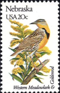 1982 Nebraska Stamp depicting the State Bird, the Western Meadowlark, and the State Flower, the Goldenrod